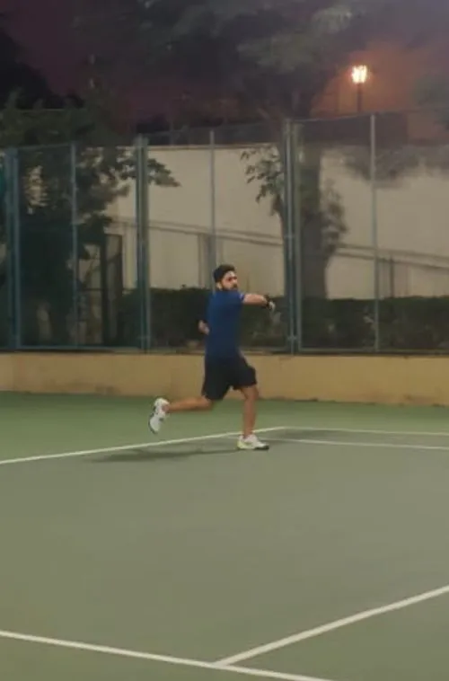 Playing tennis